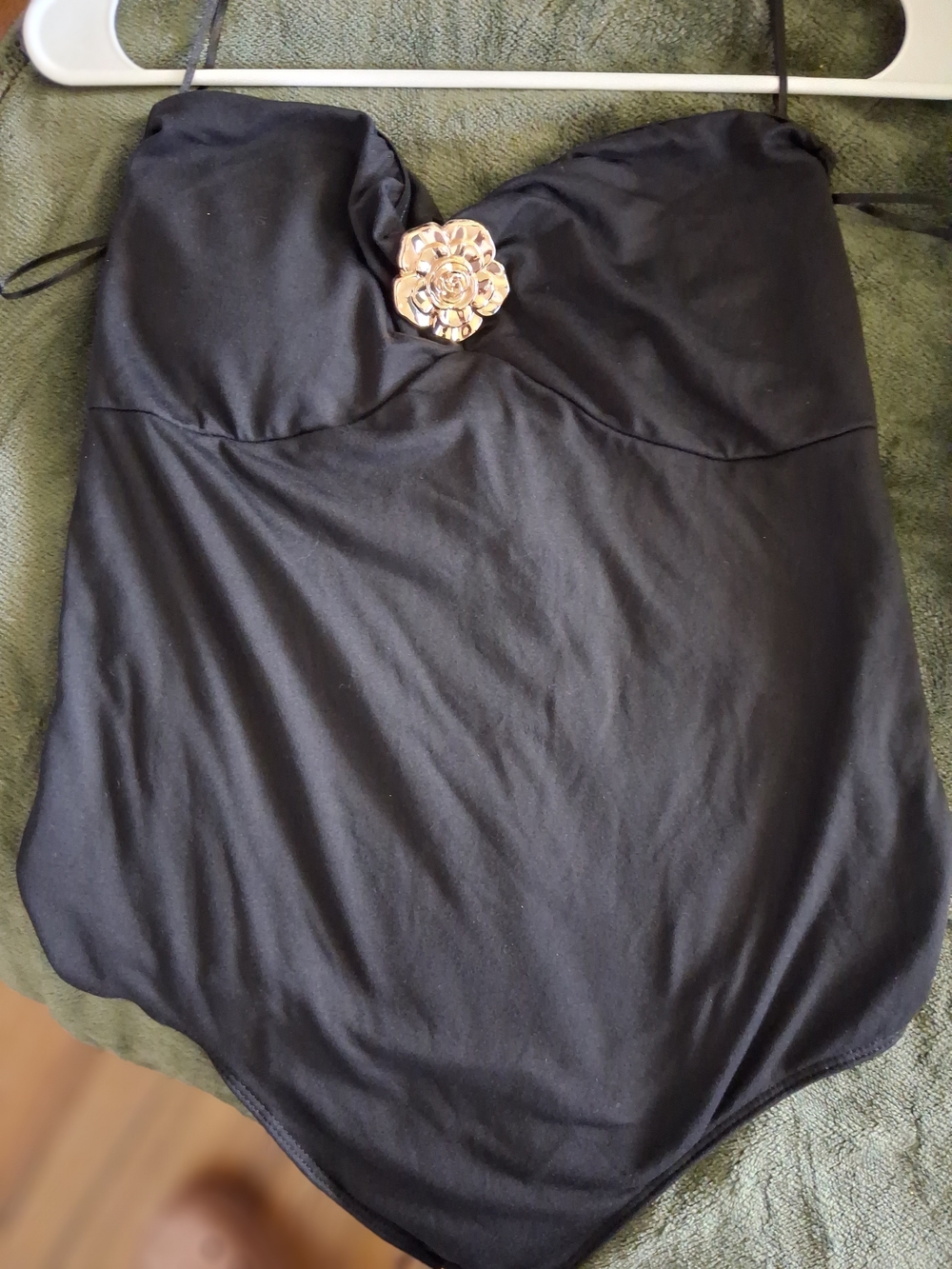 Black One-Piece Swimsuit with Gold Flower Accent